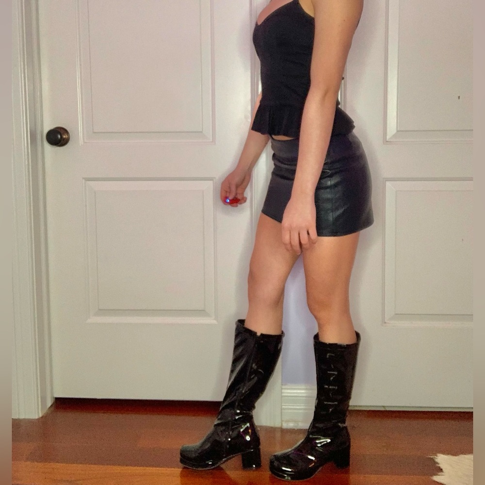 Knee high patent leather heeled boots